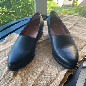 Black Dansko wedge loafers.